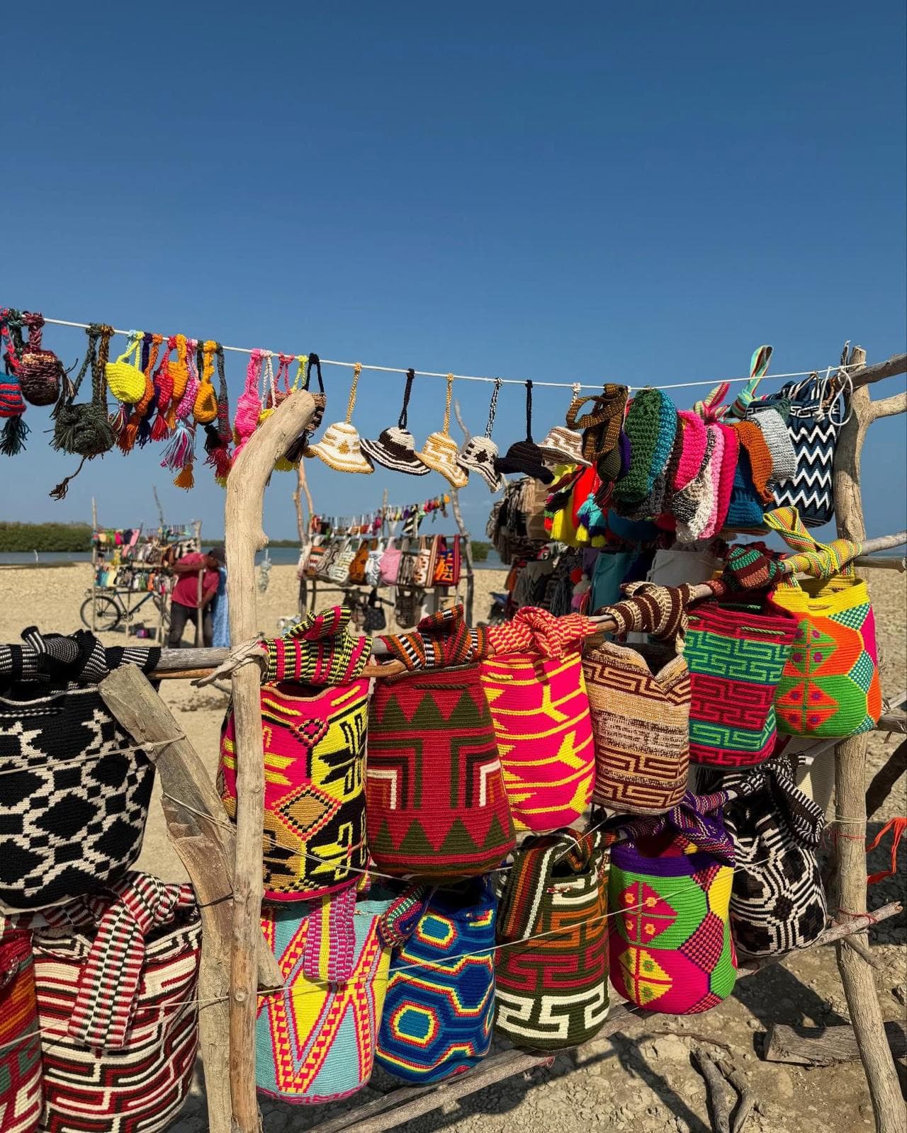 Colorful woven Wayuu bags displayed in La Guajira
